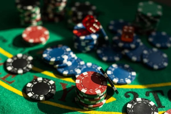 Professional dealers at live blackjack table